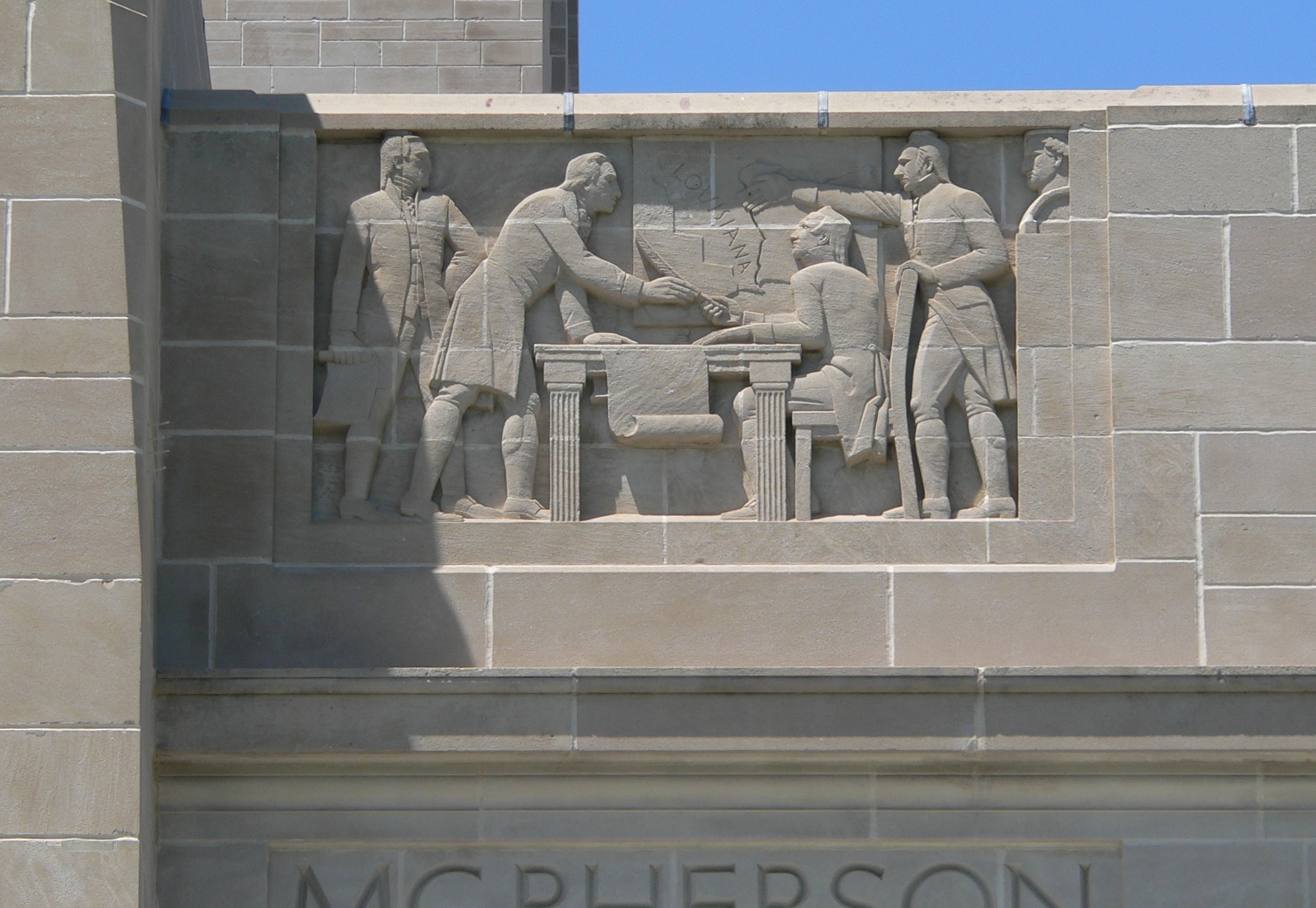 Sculptured panel on exterior of Nebraska State Capitol in Lincoln, Nebraska.  This panel, titled "The Purchase of Louisiana from Napoleon", is on the east side of the building, just north of the east entrance.